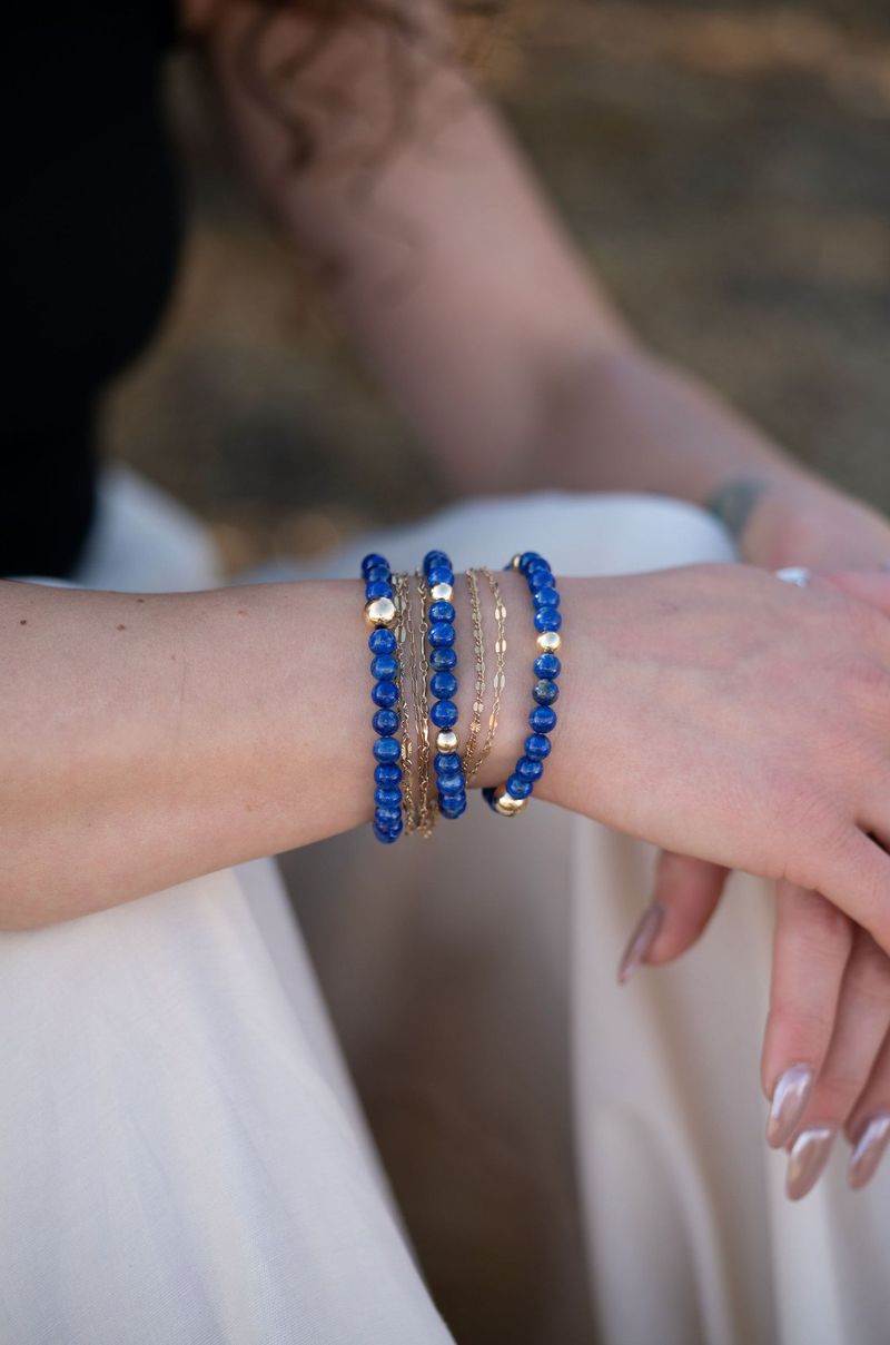Lapis Lazuli bracelet stacked on a wrist
