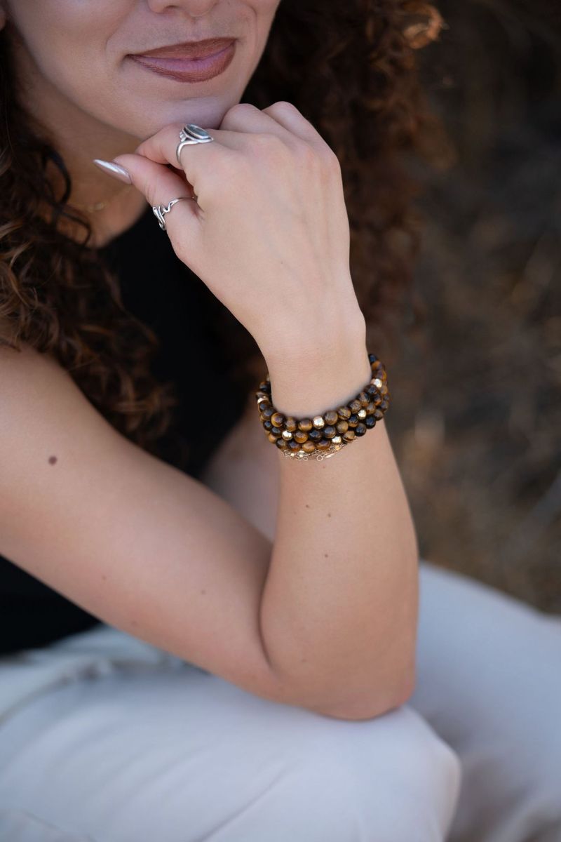 Tigers Eye bracelet stacked on a wrist